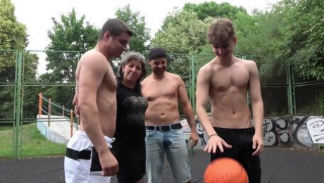 Amateur granny gets fucked in gangbang on the basketball court