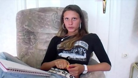 An amazing looking German teen pleasing her tight pussy