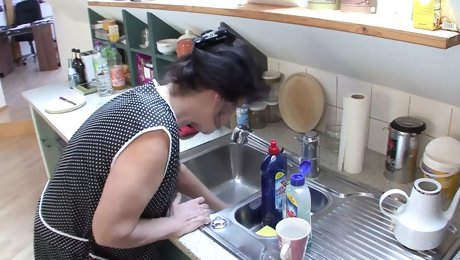 Cleaning lady 57 Helga fucked in the kitchen