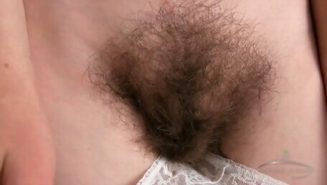 Big tits very hairy bitch loves taking off her clothes